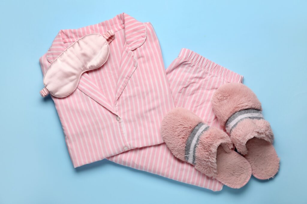 Pyjamas and slippers laid out for a sleepover